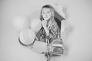Face kid for magazine cover. Girl kids face portrait in your advertisnent. Small girl child with party balloons