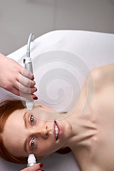 Face lifting by ultrasound using a special cosmetology device