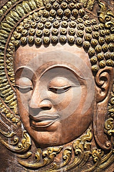 Face of Lord Buddha, native Thai style wood carving