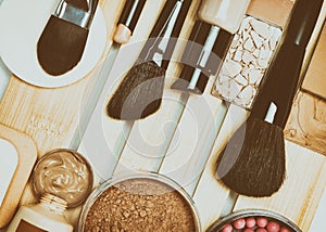 Face make-up products with professional makeup brushes, retro st