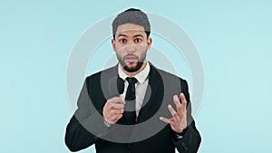 Face, man and journalist speaking on microphone in studio isolated on a blue background mockup space. Portrait, news