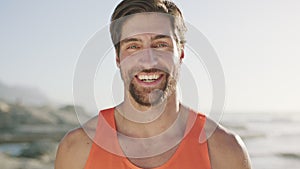 Face of man, laughing in outdoor sunshine and summer holiday in Australia to beach. Young happy guy with a comic smile