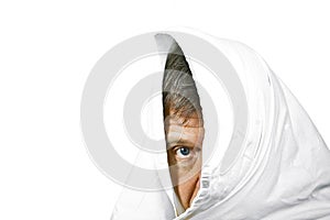 Face of man partially covered