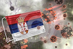 Face mask with flag of Serbia, defending coronavirus
