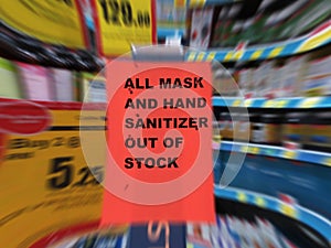 Face Mask/Hand Sanitizer Out Of Stock Notice With Zoomed-in Blur