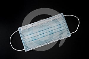 Face masks for virus protection on black background photo