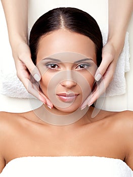 Face Massage. Close-up of a Young Woman Getting Spa Treatment.