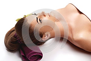 Face Massage. Close-up of a Young Woman Getting Spa Treatment. Spa skin and body care. Facial beauty treatment