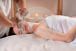Face massage. young woman getting massage treatment at spa salon. Spa skin and body care. beauty facial beauty treatment