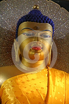 Face of The Merciful Buddha, India. photo