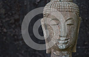 Face of old imgae of buddha statue Thailand temple