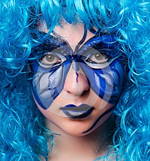 Face paint of woman with butterfly