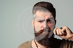 Face portrait of bearded man. Barber shop. Men hairstyle, beard and mustache