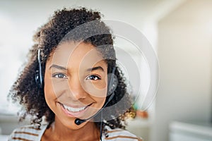 Face, portrait or happy black woman in call center with smile talking or networking in telemarketing. Smiling