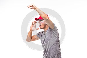 Face portrait of Poland football fan scream support Poland national team on white background. Football fans concept.