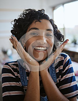 Face portrait, woman artist and creative with paint on hands after painting in art school. Creativity, smile and