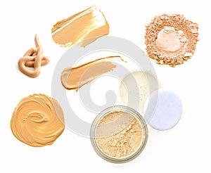 Face powder and brush make up over white background.