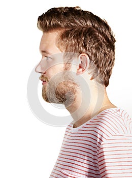 Face profile, hair and beard with man in studio isolated on white background for masculine grooming. Beauty, model and