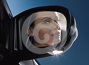 Face in rear-view mirror