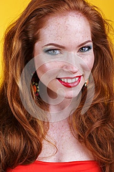 Face of redheaded girl with fashion makeup