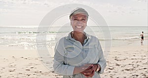 Face, relax and elderly woman at a beach for travel, vacation and summer holiday outdoors. Portrait, smile and senior