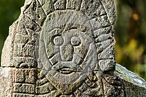 Face on a rune stone