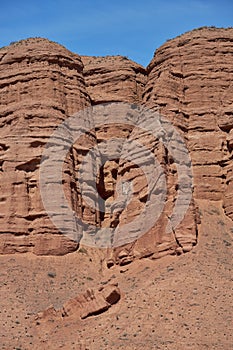 Face on sandstone rock. Pareidolia, looks like a face. Pareidolic illusion, seeing faces in inanimate objects photo