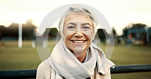 Face, senior woman and smile on park bench on vacation, holiday or travel in winter. Portrait, happy and elderly person