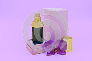 Face serum on pink paper background