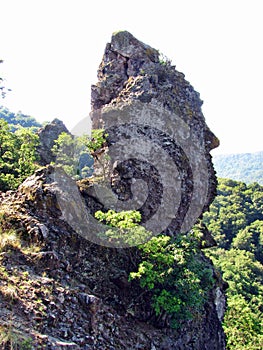 Face shaped rock on a hill in Hungary