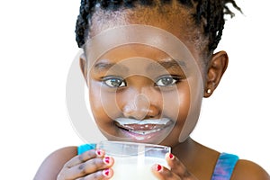 Face shot of sweet african girl with milk mustache.