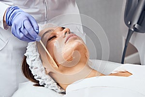 Face Skin Care. Close-up Of Woman Getting Facial Hydro Microdermabrasion Peeling Treatment At Cosmetic Beauty Spa Clinic