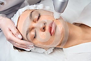 Face Skin Care. Close-up Of Woman Getting Facial Hydro Microdermabrasion Peeling Treatment At Cosmetic Beauty Spa Clinic