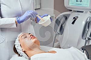 Face Skin Care. Close-up Of Woman Getting Facial Hydro Microdermabrasion Peeling Treatment At Cosmetic Beauty Spa Clinic