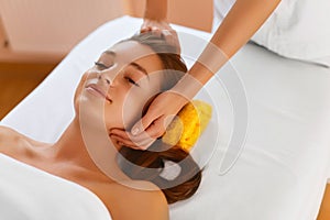 Face skin. Woman receiving facial spa treatment, massage.