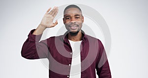 Face, smile and black man with salute hand in studio for respect, thank you or gesture on grey background. Hello