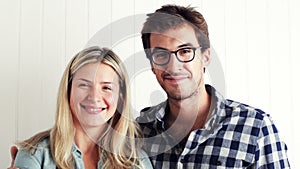 Face, smile and love with couple hugging in studio on white background for marriage, romance or bonding. Portrait, happy