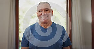 Face, smile and senior man with arms crossed in home, living room and apartment for retirement. Portrait, happy elderly