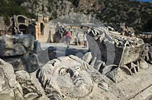 Face stone carving in ancient town of Myra in Lycia region, Antique culture archaelogical site, Ruins of ancient city