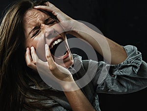 Face, stress and horror with woman yelling in studio on black background for reaction to fear. Phobia, mental health and