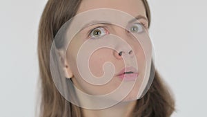 Face of Surprised Young Woman on White Background