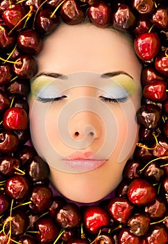 Face surrounded by fruit