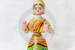 Face of a Thanjavur dancing doll Called as Thalaiyatti Bommai in Tamil language with look alike traditional dress and oranments