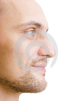 Face unshaven young man in profile photo