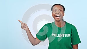 Face, volunteer and hand gesture by black woman in studio for faq, checklist or sign up info on blue background. Smile