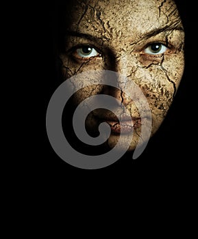 Face of woman with cracked dry skin