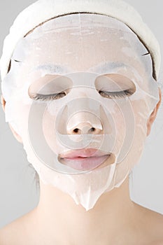 Face of woman with a facial pack