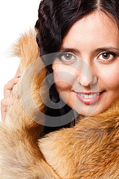 Face of a woman with fur