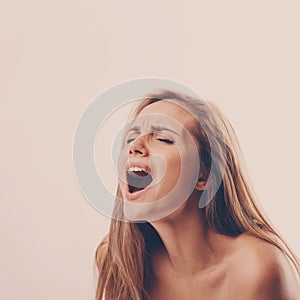 Face of a woman during an orgasm