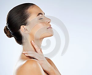 Face, woman profile and eyes closed with skin, content with skincare and beauty facial isolated on studio background